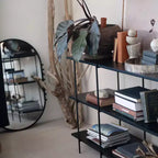 Miroir mural ovale à cadre en métal noir mat avec boules décoratives