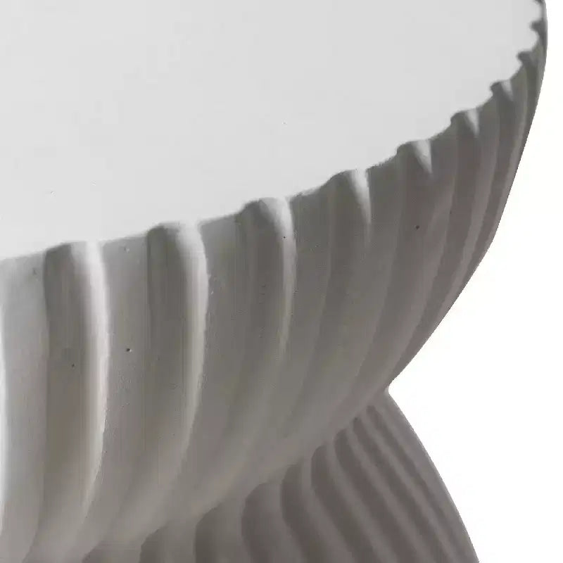 Table d'appoint sablier moderne cannelée en fibrestone, noire