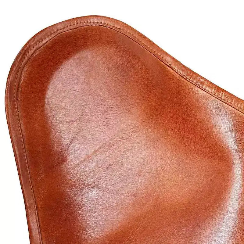 Fauteuil Butterfly en cuir véritable marron, structure en fer thermolaqué